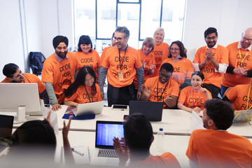 Hackers coding for charity at hackathon