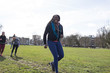 © Sam Edwards/Caia Image - Smiling, confident woman doing speed ladder drill in sunny park