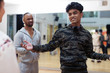 © Sam Edwards/Caia Image - Confident, cool teenage boy in dance class studio