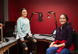 © Robert Daly/Caia Image - Portrait confident teenage girl musicians recording music in sound booth