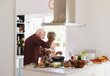 © Tom Merton/Caia Image - Active senior couple cooking in kitchen