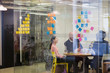 © Sam Edwards/Caia Image - Creative business people brainstorming in conference room meeting