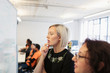 © Sam Edwards/Caia Image - Focused businesswomen brainstorming at whiteboard in office