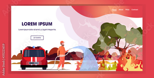firefighter extinguishing dangerous wildfire in australia fireman spraying water Poster Mural XXL