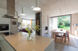 © Charlie Dean/Caia Image - Modern open plan kitchen and dining room