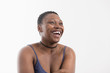 © Sam Edwards/Caia Image - Portrait laughing, carefree woman