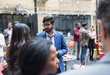 © Martin Barraud/Caia Image - Friends socializing at party on patio