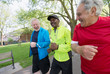 © Robert Daly/Caia Image - Active senior men friends power walking in park