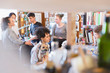 © Tom Merton/Caia Image - Creative designers with dogs in office