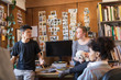 © Tom Merton/Caia Image - Creative designers with dog brainstorming in office
