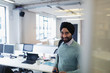 © Sam Edwards/Caia Image - Portrait smiling, confident Indian businessman in turban