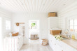 © Charlie Dean/Caia Image - White wood shiplap home showcase laundry room