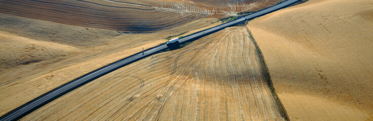 Wall Mural - Semi-Truck driving through Wheat Fields, S.E. Washington