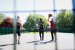 © Tom Merton/Caia Image - Active senior men playing basketball in sunny park