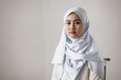 © Sam Edwards/Caia Image - Portrait confident, serious young woman wearing hijab
