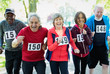 © Tom Merton/Caia Image - Portrait enthusiastic active senior friends running sports race