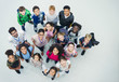 © Robert Daly/Caia Image - Portrait confident junior high students and teachers from above