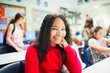 © Paul Bradbury/Caia Image - Portrait smiling, confident junior high school girl in classroom