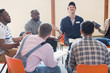 © Tom Merton/Caia Image - Men praying with bibles in prayer group circle