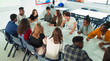 © Paul Bradbury/Caia Image - High school students talking at table in debate class