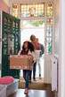 © Robert Daly/Caia Image - Family moving into new house