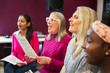 © Chris Ryan/Caia Image - Womens choir singing in music recording studio