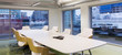 © Tom Merton/Caia Image - Conference table in modern, urban conference room