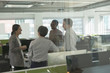© Tom Merton/Caia Image - Business people talking in office