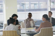 © Tom Merton/Caia Image - Business people talking in conference room meeting