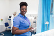 © Sam Edwards/Caia Image - Portrait confident female nurse using digital tablet in hospital room