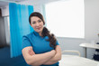 © Sam Edwards/Caia Image - Portrait confident female nurse in hospital room