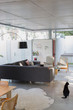 © Tom Merton/Caia Image - Black cat in luxury home showcase interior living room