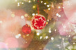 © Tom Merton/Caia Image - Red and white snowflake ornament hanging on Christmas tree