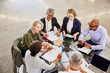 © Ryan Lees/Caia Image - Business people talking in meeting