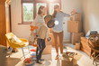 © Justin Pumfrey/Caia Image - Mother helping young adult daughter moving into new apartment
