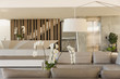 © Tom Merton/Caia Image - Modern, luxury home showcase interior living room with orchids