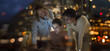 © Tom Merton/Caia Image - Businesswomen working late at laptop in office at night