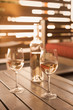 © Tom Merton/Caia Image - Rose wine on wooden patio table