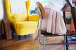 © Sam Edwards/Caia Image - Cute barefoot girl in tutu kneeling on chair