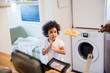 © Sam Edwards/Caia Image - Curious toddler girl waiting for waffles in kitchen