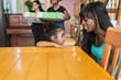 © Sam Edwards/Caia Image - Mother and toddler daughter in dining room