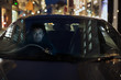 © Tom Merton/Caia Image - Portrait man driving car at night