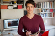 © Tom Merton/Caia Image - Portrait confident man working in home office
