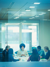 Smiling Businesswoman In Conference Room Meeting
