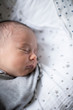 © Sam Edwards/Caia Image - Tired newborn baby boy sleeping