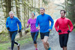 © Robert Daly/Caia Image - Family jogging in woods