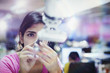 © Tom Merton/Caia Image - Focused female engineer repairing robotic arm