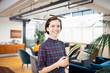 © Sam Edwards/Caia Image - Portrait confident businesswoman in office