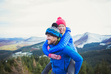 Happy Couple On Mountaintop