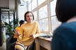 © Sam Edwards/Caia Image - Businesswomen talking in office